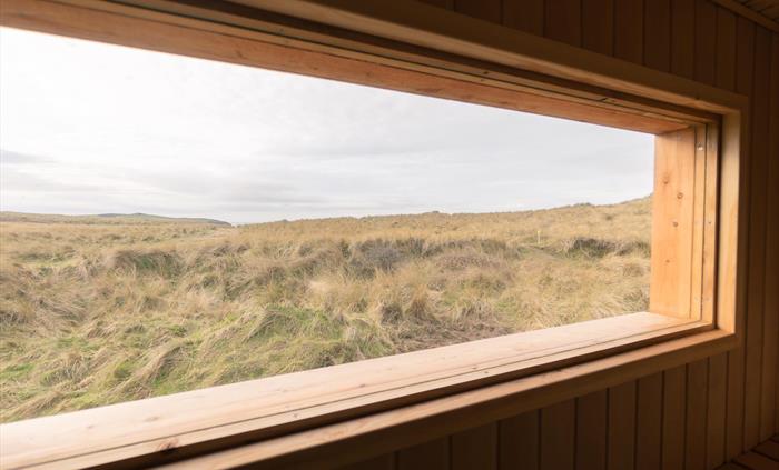View from sauna room to the dunes